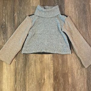 Multi color turtleneck.